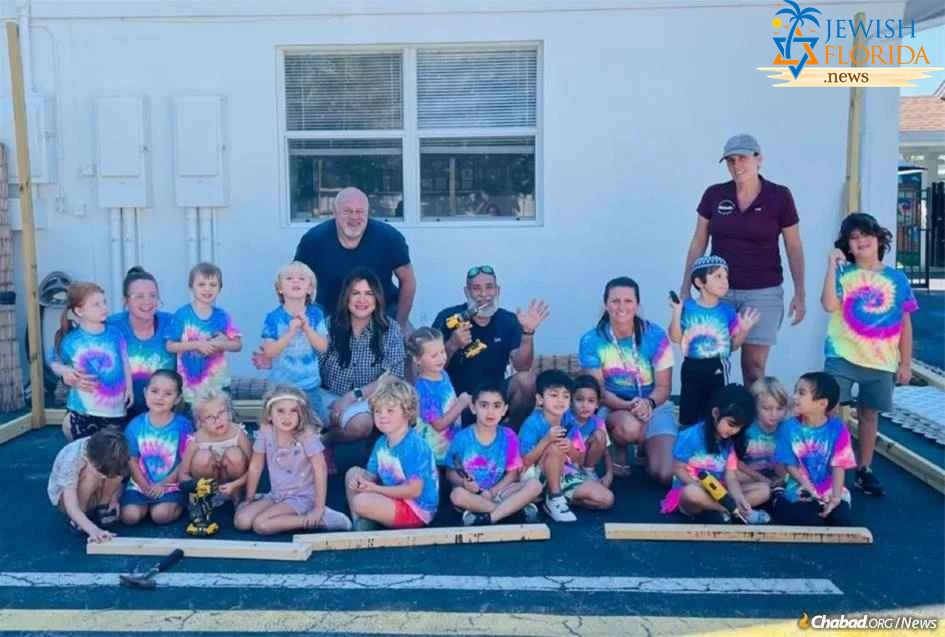 Children at the Chabad Preschool of the Arts in Naples, Fla., helped build and decorate the sukkah on their first day back to school post-hurricane. Many of the children in the preschool have been displaced or lost their homes completely.